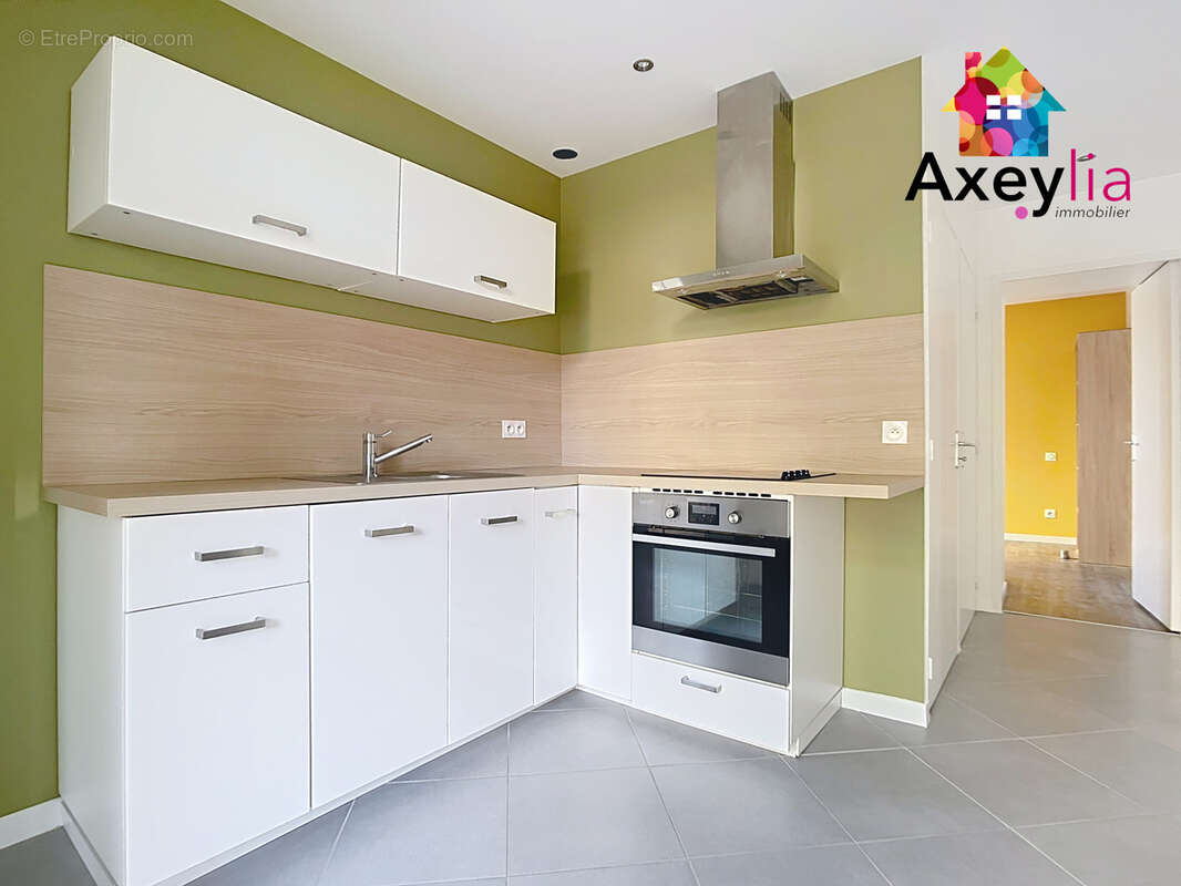 A vendre - roanne centre - appartement t2 loué et rénové en rez-de-jardin avec courette - photo 4