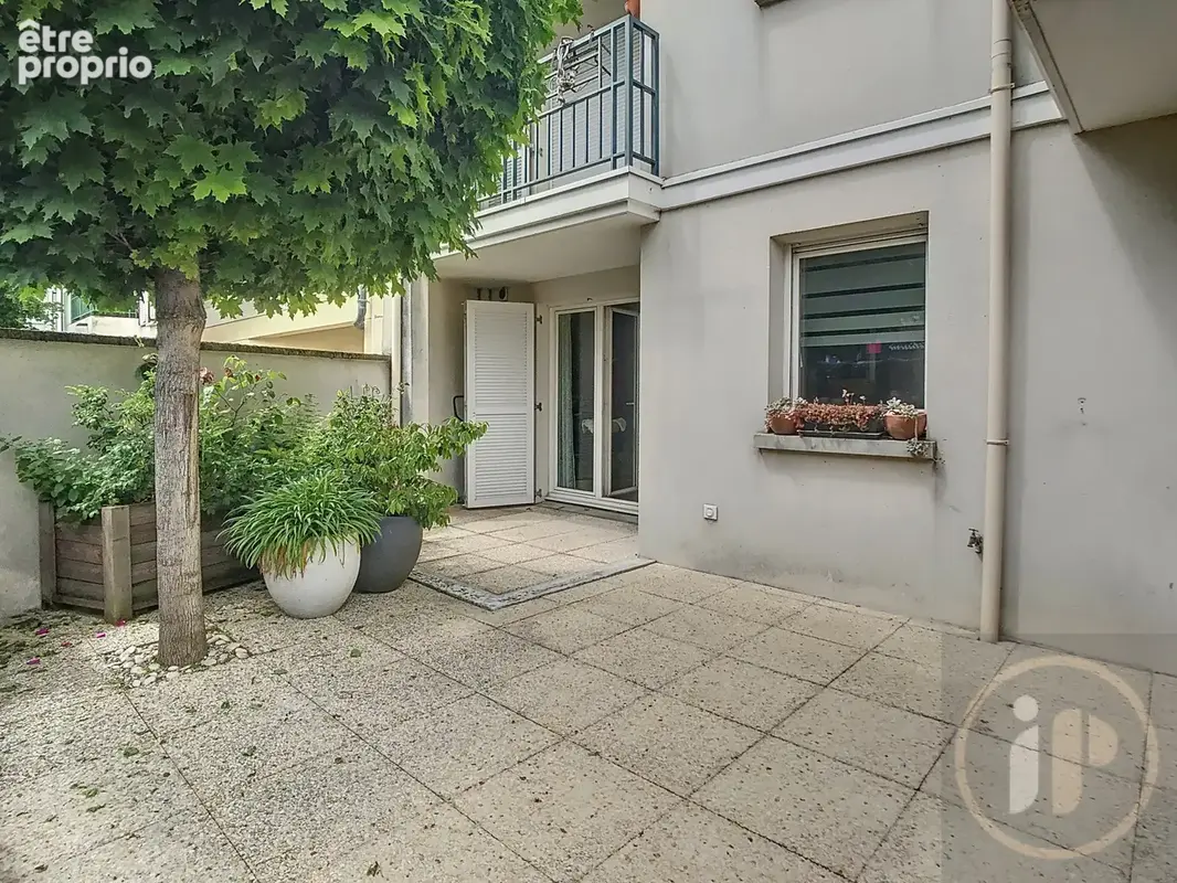 Appartement traversant avec jardin et cour - photo 10