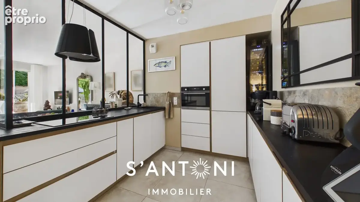 Élégant T2 de 55 m² avec terrasse et climatisation réversible  Immeuble de standing - photo 3