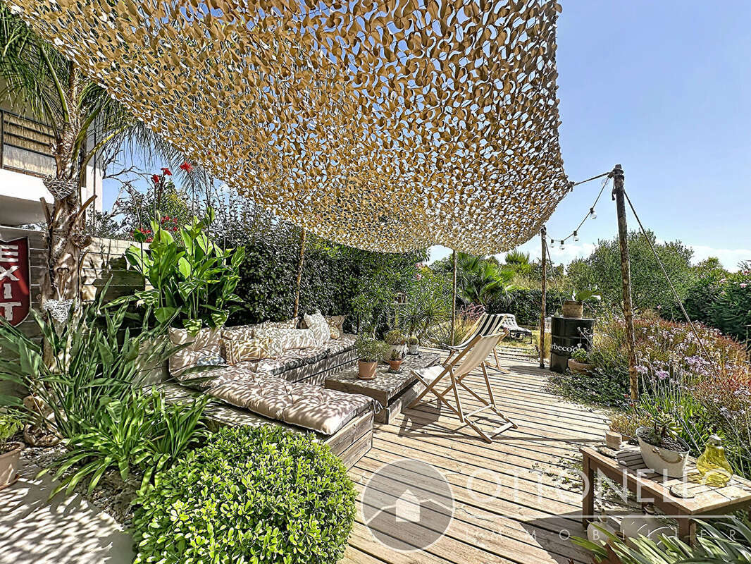 Maison 3 pièces 57.75 m2 LOUÉE sur un terrain de 188 m2 avec deux terrasses, garage et parking - photo 4