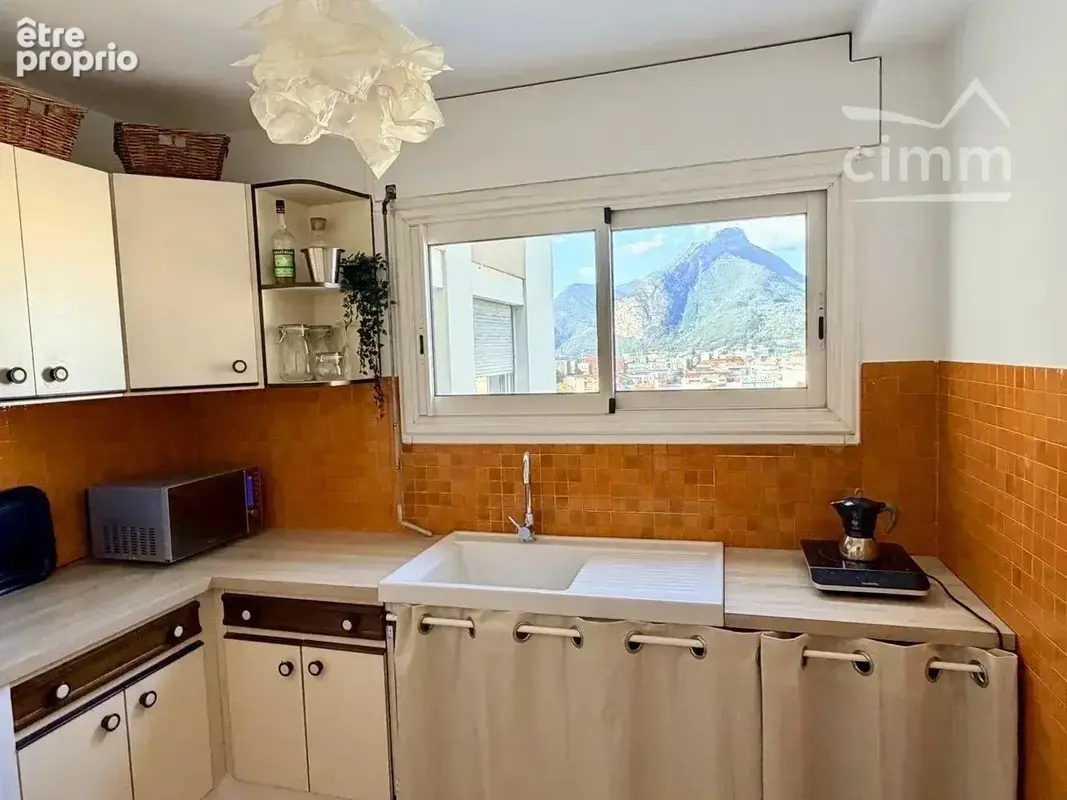 T2 rénové 43 m² – 11e étage – balcon – vue massifs - photo 11