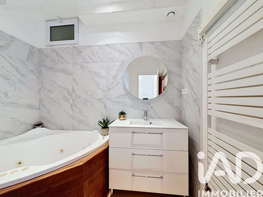 Photo 8 - Appartement à LEVALLOIS-PERRET