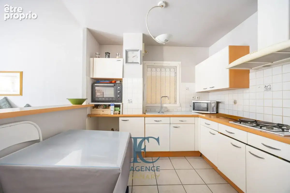 Appartement T3 de 82 m2 en rez-de-jardin au centre-ville - photo 4