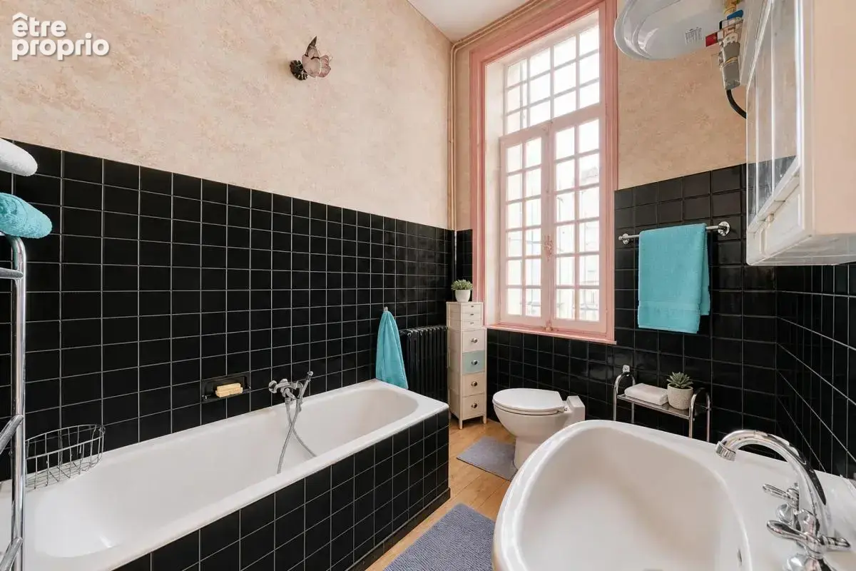 Appartement de 3 pièces de 94 m² à Saintes - photo 8