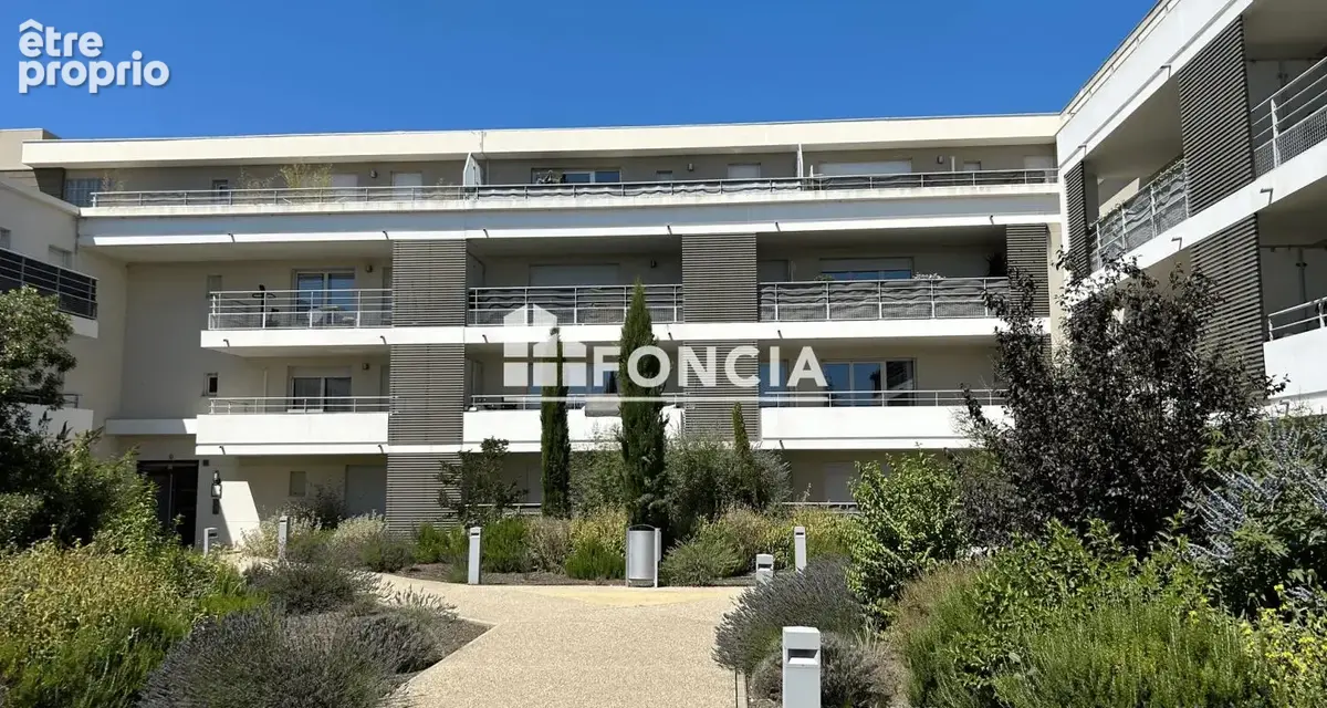 Appartement de type 3 dans une résidence sécurisée avec place de parking - photo 2
