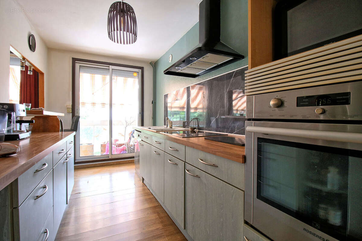 A vendre - bel appartement 4 pieces - garage - balcon - photo 4