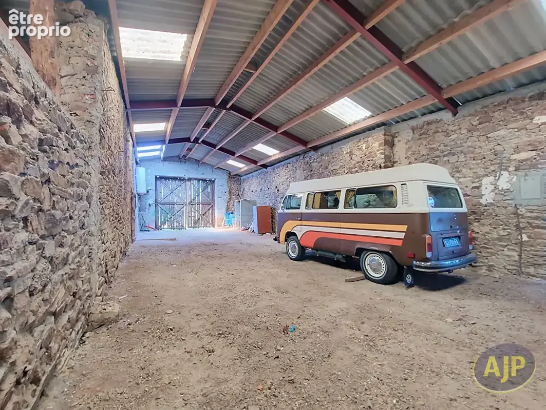 Belle grange en pierre sur + 1800 m² - photo 5