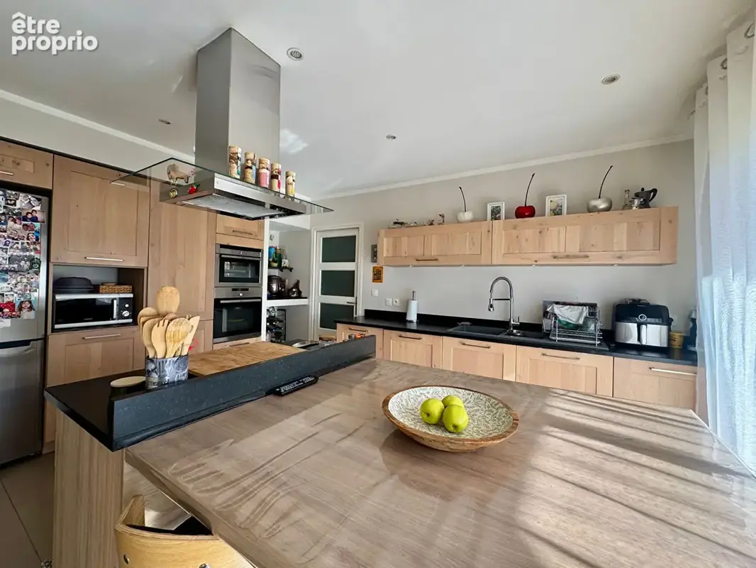 Superbe plain-pied de 149 m² avec jardin et stationnement ! - photo 3