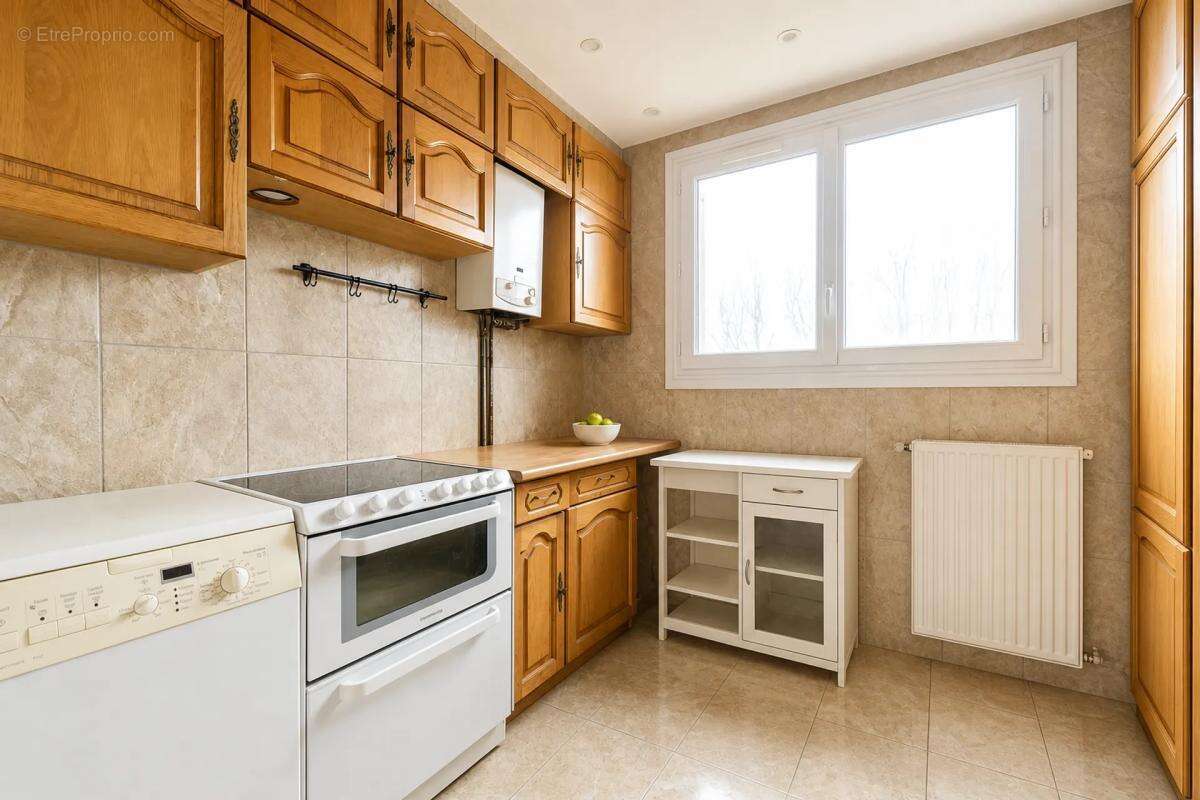Appartement 3 pièces de 58 m2 en vente à Les Clayes-sous-Bois - Idéal pour investisseurs - photo 4