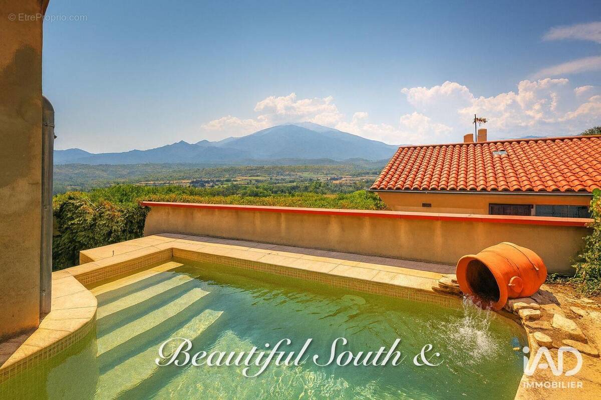 Photo 1 - Maison à EUS