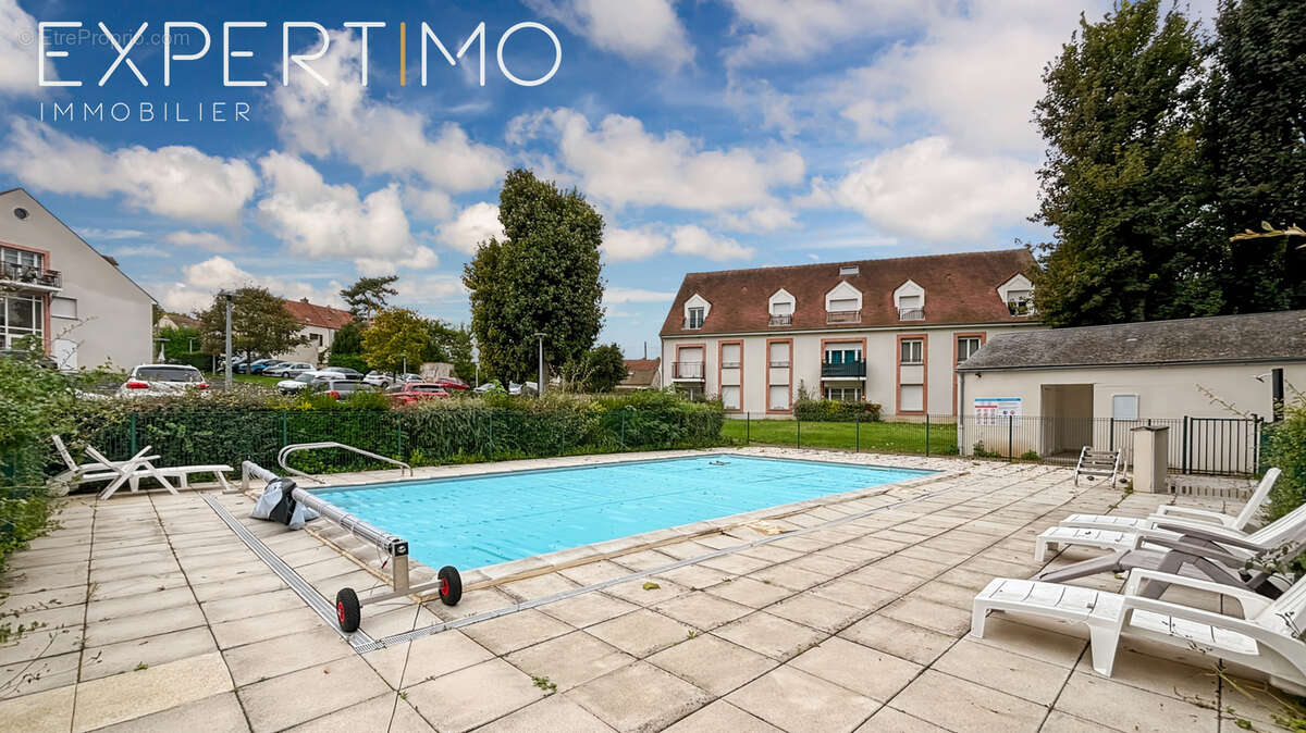 À vendre appartement F3 RDC avec terrasse et deux places de stationnement - photo 9