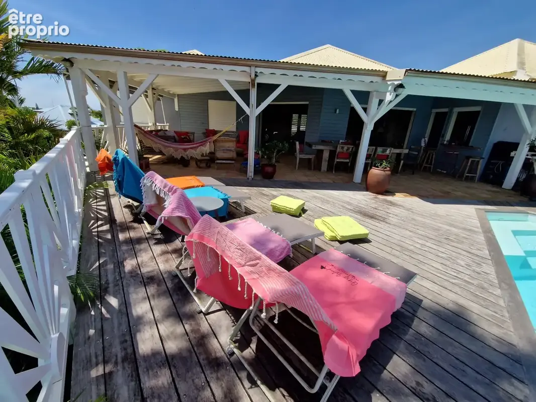VUE MER Superbe villa de standing + T3 piscine à débordement sur 1000 m² à BAIE MAHAULT (971) - photo 4