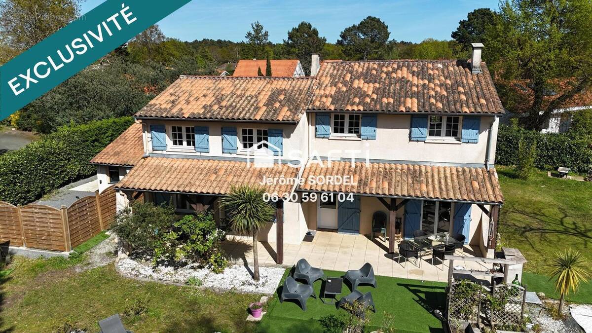 Photo 1 - Maison à LE TAILLAN-MEDOC