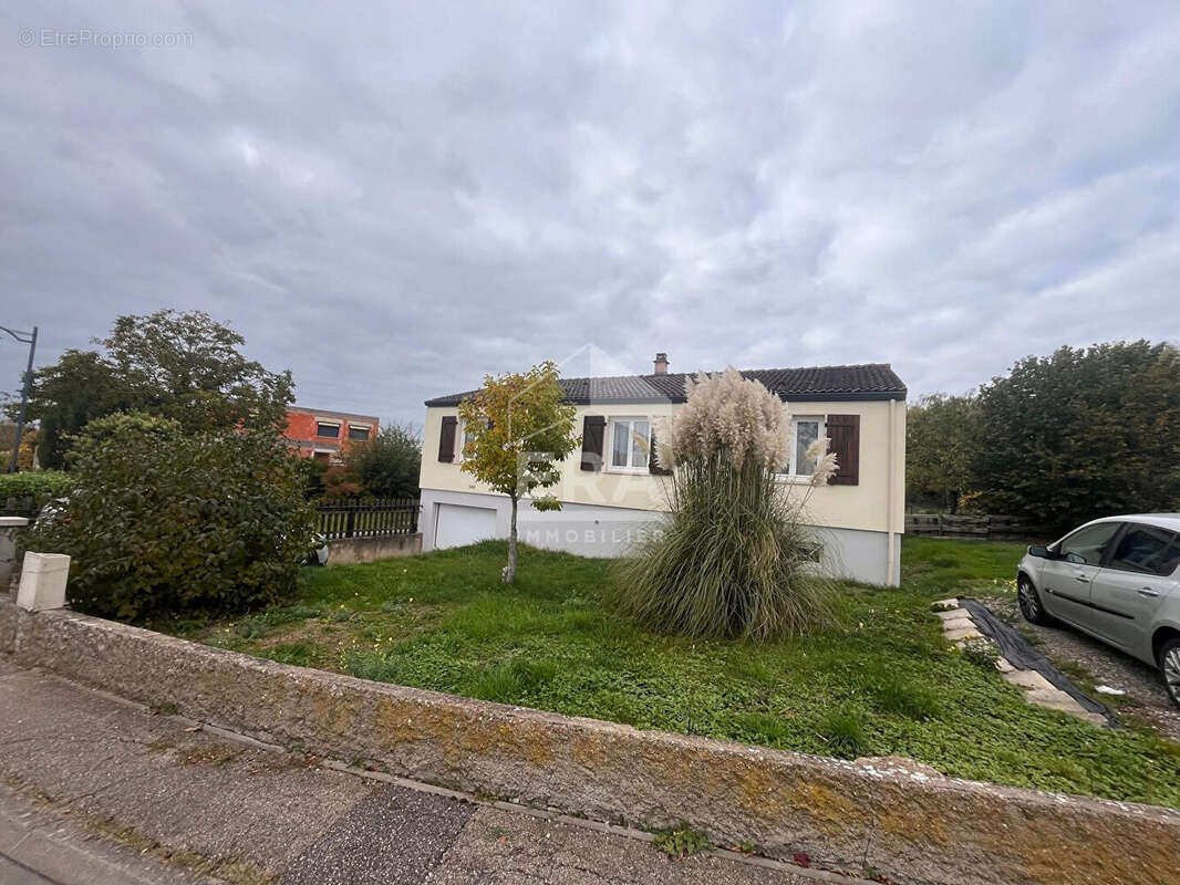 Maison à LOUVIGNY