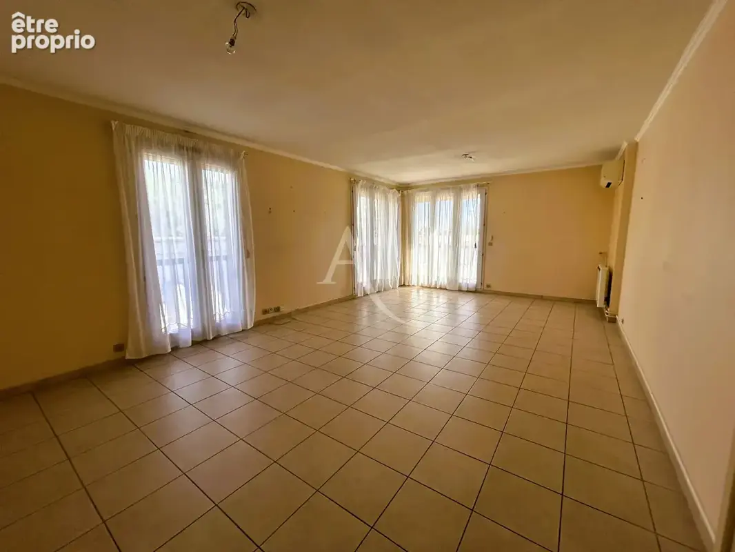 Vaste appartement Perpignan 3 pièces, double balcon et cave secteur Verte Feuille - photo 1