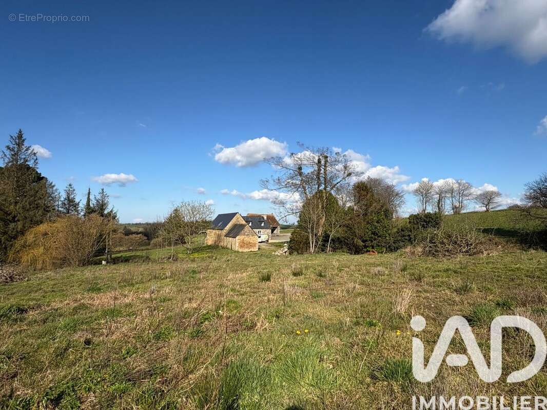 Photo 3 - Terrain à CAOUENNEC-LANVEZEAC