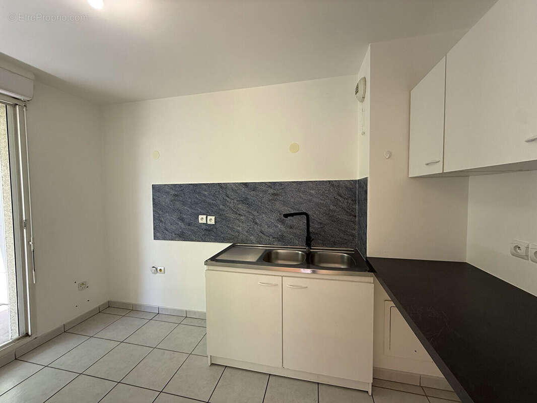 Appartement 3 pieces 61.89 m² + balcon + parking s/sol - photo 4