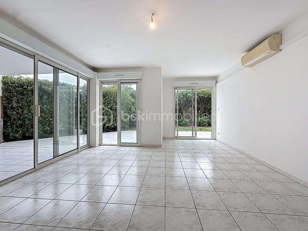 Appartement 2 pièces de 59 m2 avec jardin de 130 m2 + parking et cave - photo 9