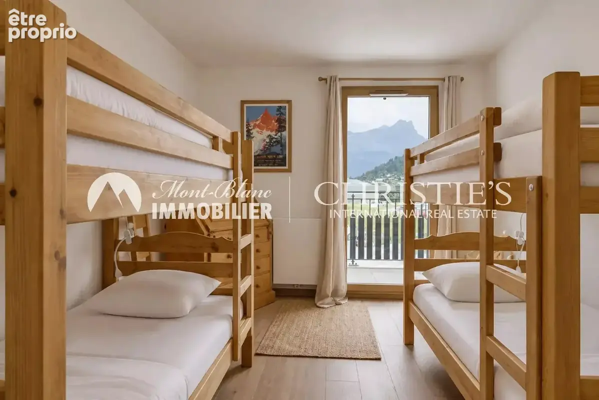 APPARTEMENT - centre village - photo 5