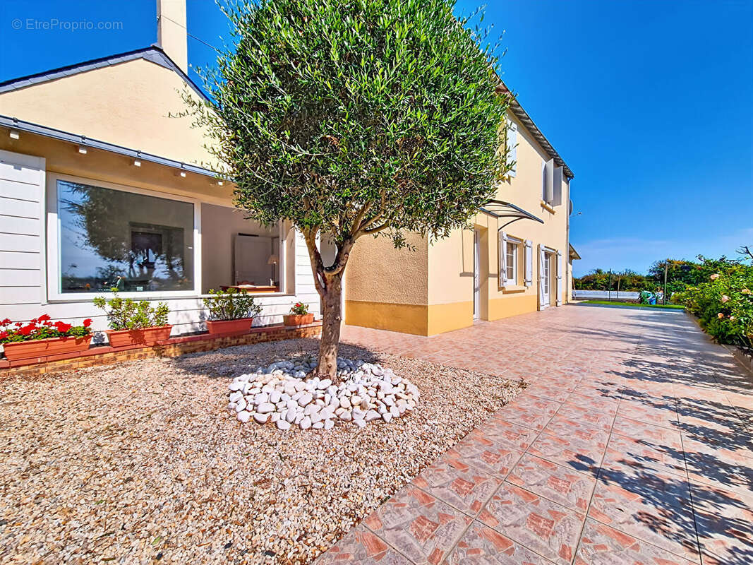 Maison à SAINT-BARTHELEMY-D&#039;ANJOU