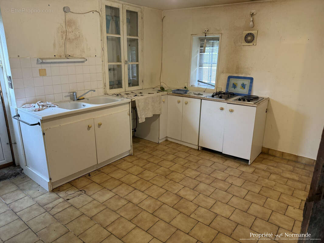 Maison à PONT-L'EVEQUE