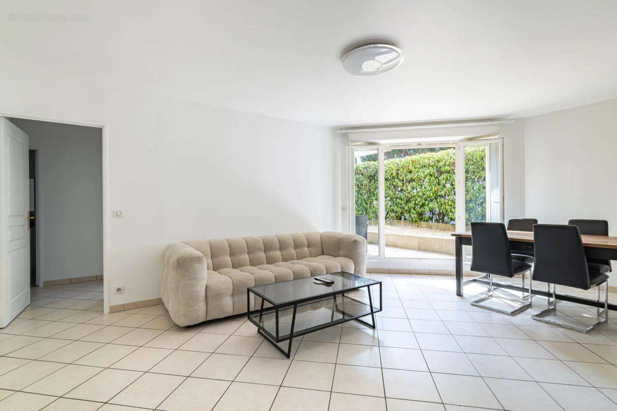 Bel appartement 4 pièces avec jardin, cave et parking - photo 7