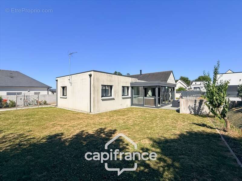 Maison contemporaine de plain-pied de 160 m² – 4 chambres – Véranda de 27 m² avec spa – Double garage – Carport – Noyal-Pontivy - photo 31