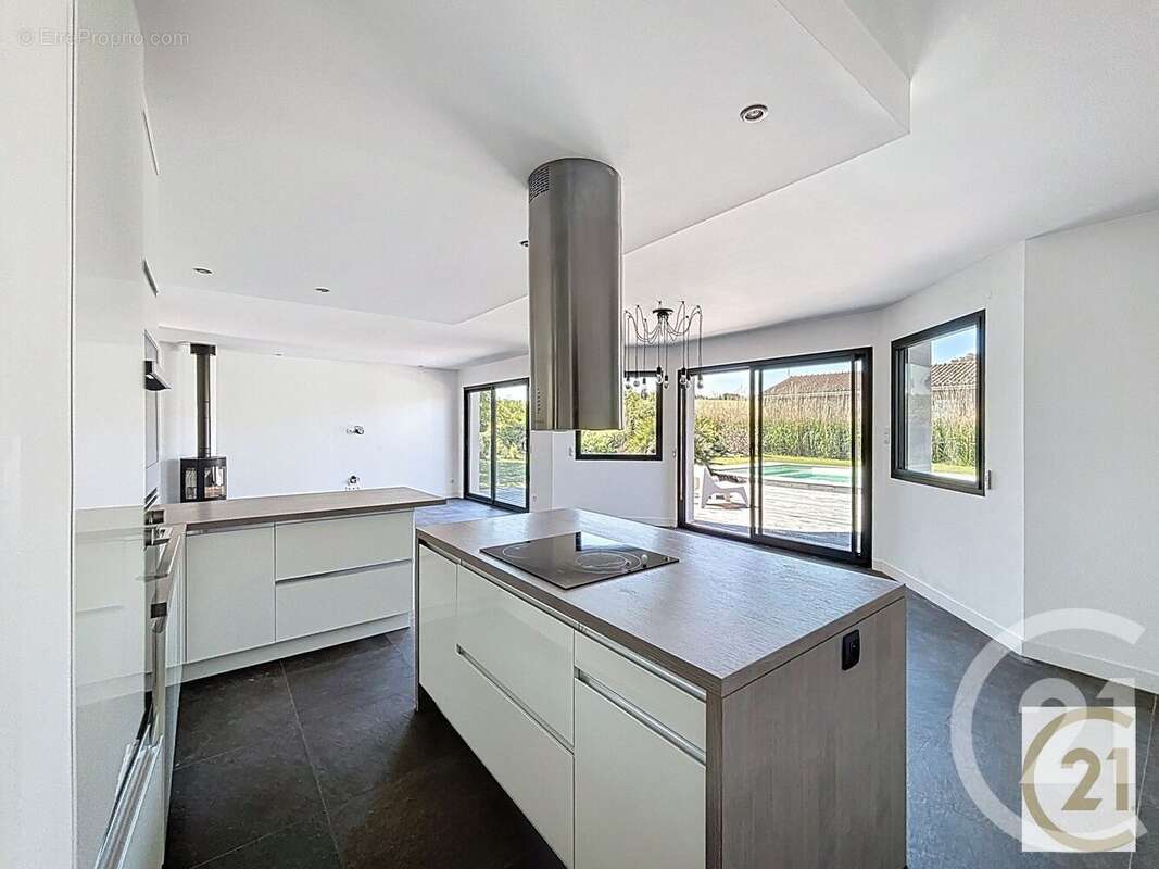 Maison à AYGUESVIVES