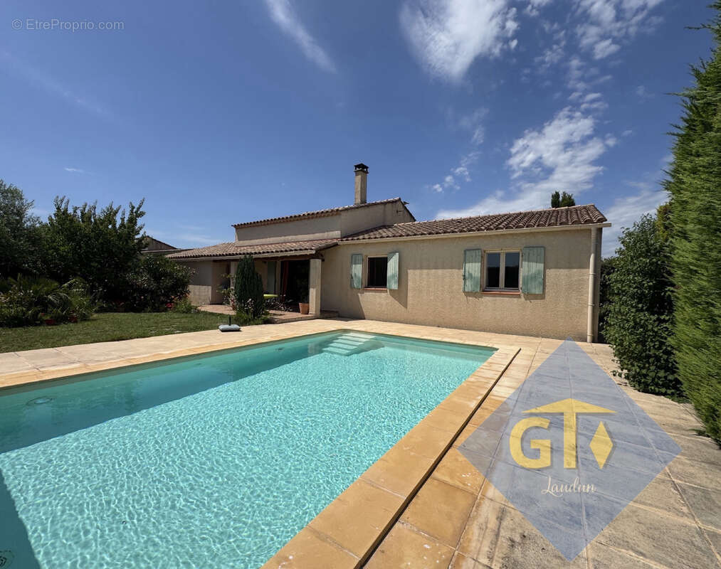 Maison à LAUDUN-L'ARDOISE