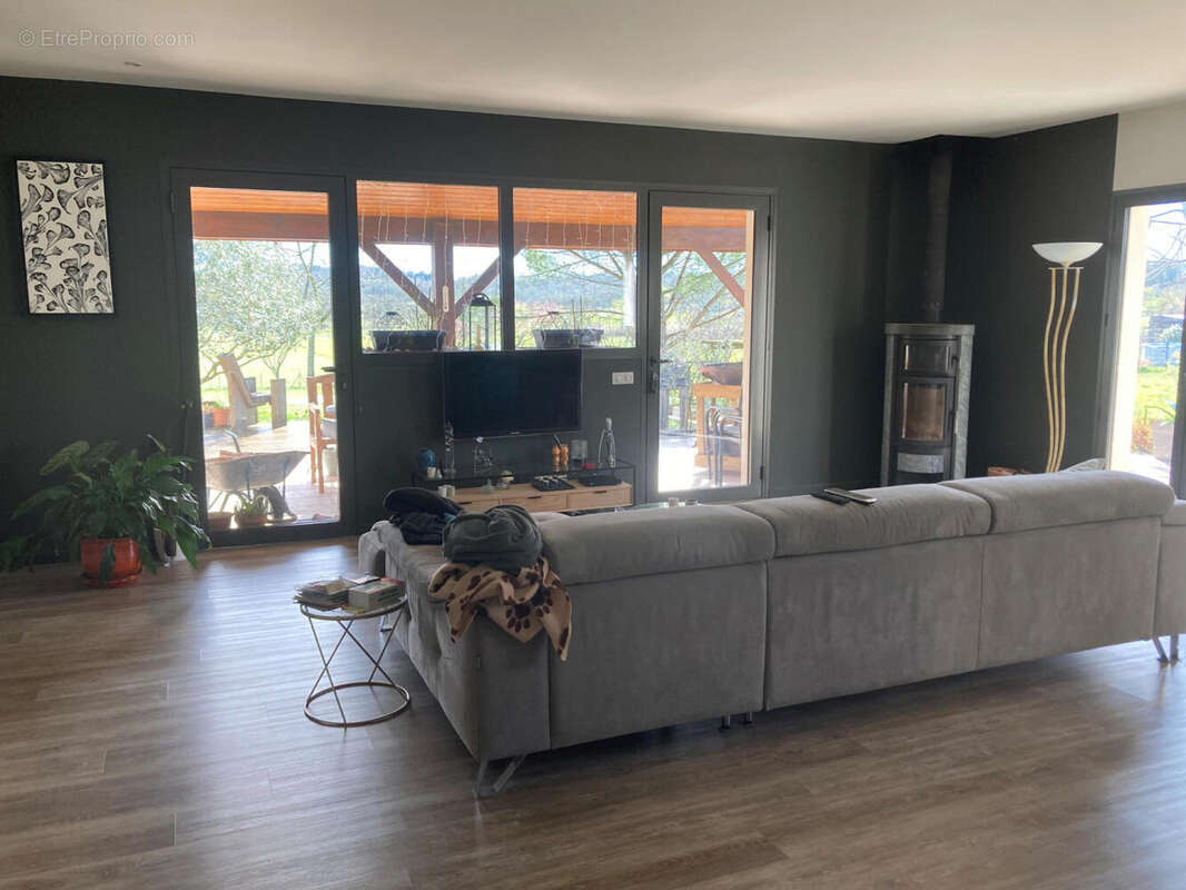 séjour vue terrasse - Maison à ARCAMBAL