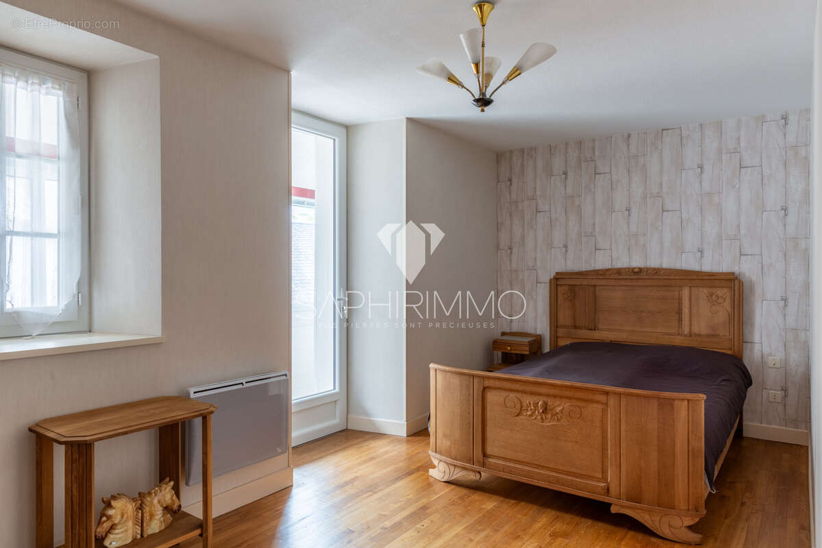 Maison d'habitation en pierre 4 pièces - 112m2 - au cœur du bourg - photo 12