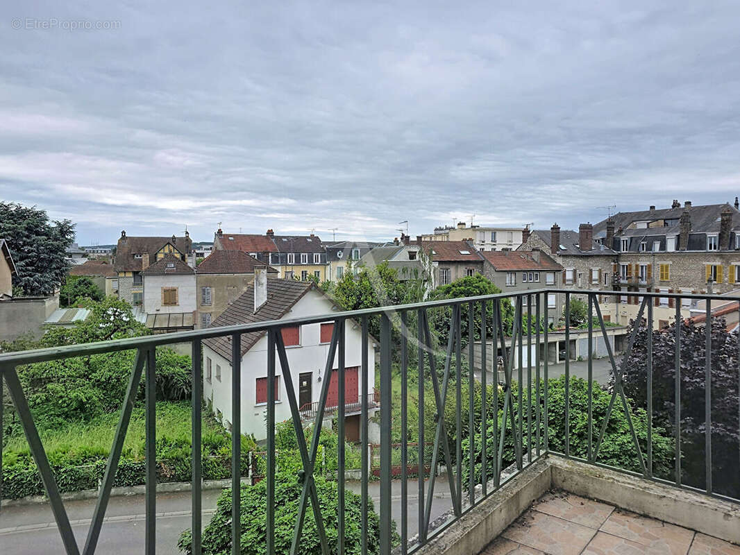 Mantes-la-Jolie Centre-ville Appartement 3 pièces de 67 m² avec balcon, ascenseur, box et cave ? Proche gare - photo 9