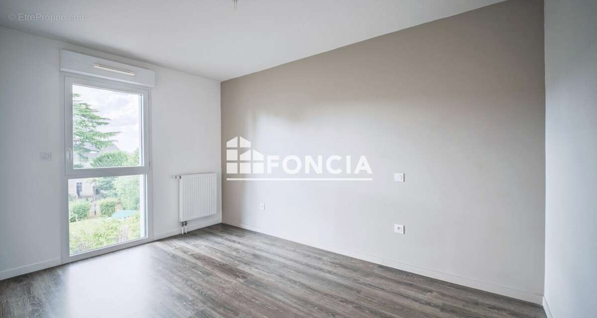 EXCLUSIVITE FONCIA quartier NANTES SUD / BOURDONNIERES : bel appartement T3 récent avec balcon, stationnement couvert, à proximi - photo 8