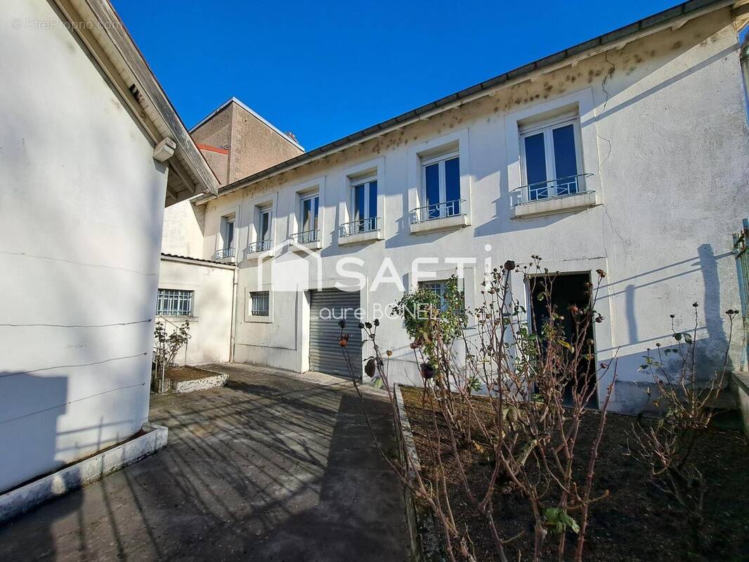 Photo 1 - Maison à NEUFCHATEAU