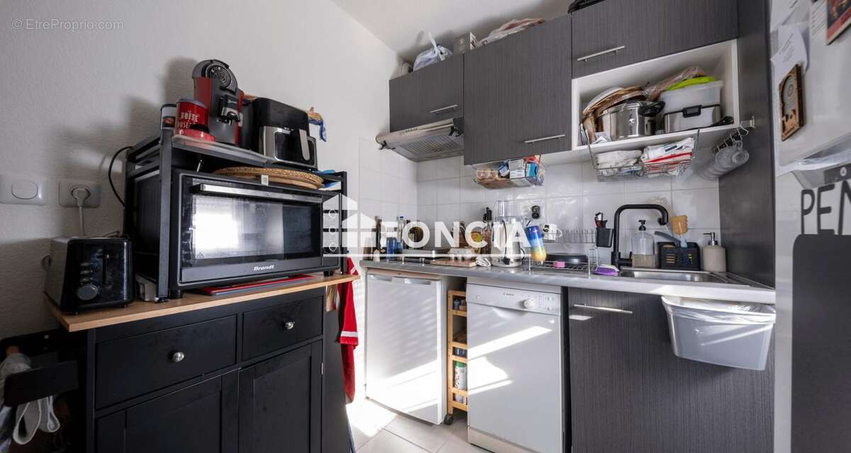 Appartement T2 en RDJ avec parking - photo 7