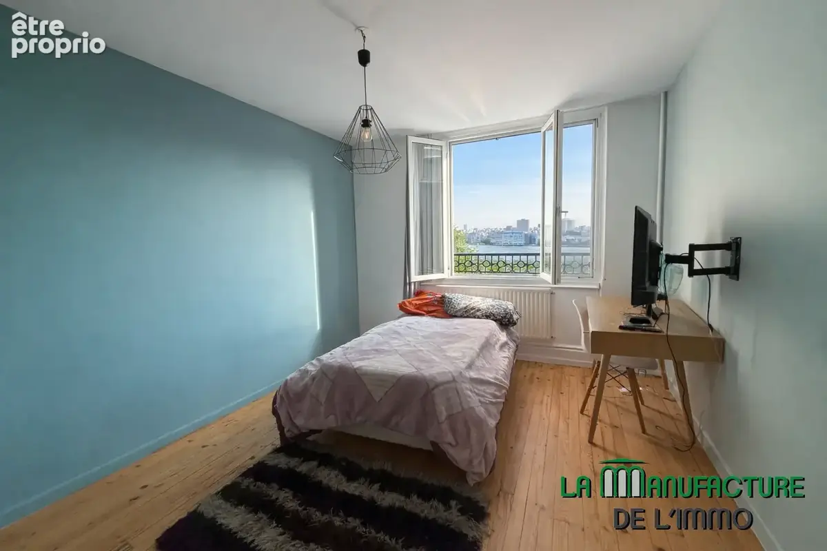 Appartement t4- 89,52m2 - cave - rue marengo - saint-etienne. - photo 7