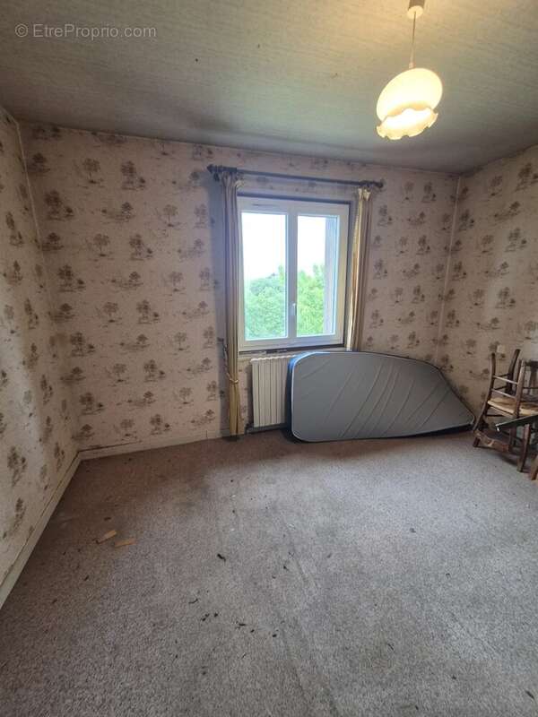 Maison de plain pied avec sous sol semi enterré - photo 4