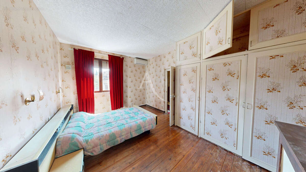 Maison d'habitation en centre ville - photo 11