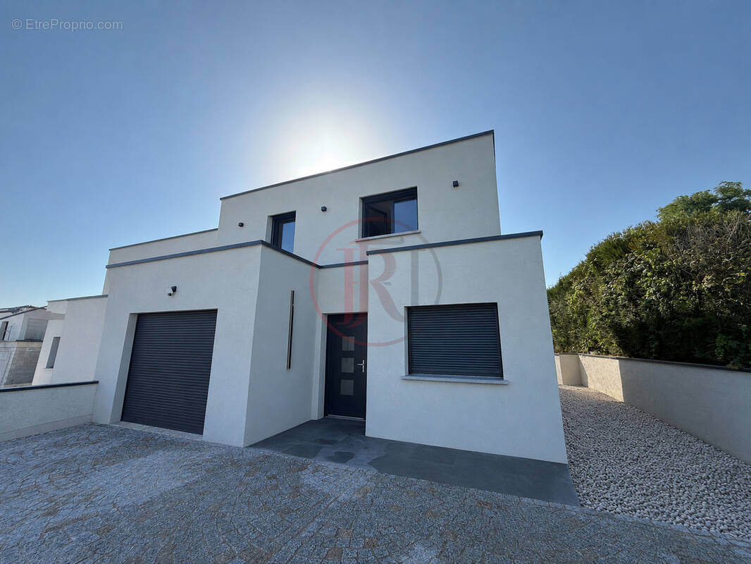Maison à POUILLEY-LES-VIGNES