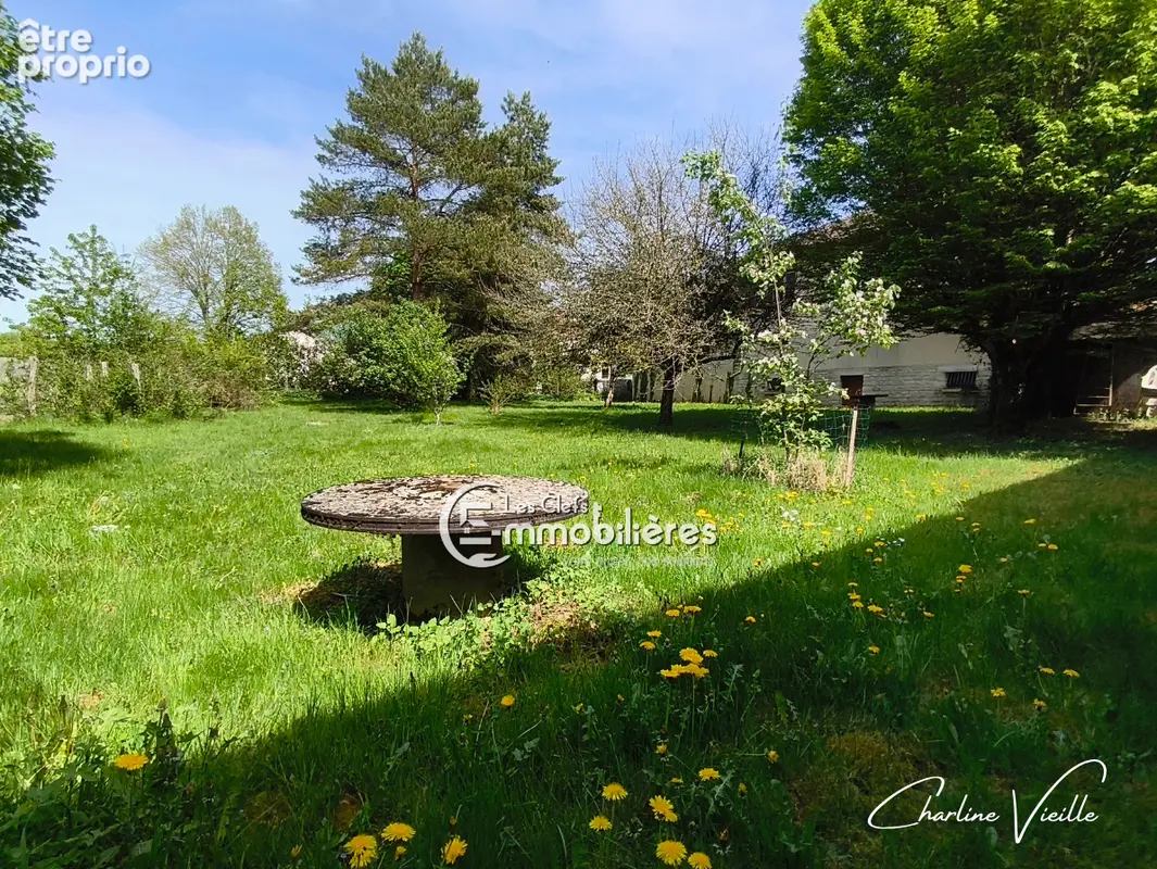 Maison familiale avec grand terrain arboré et potentiel de rénovation - photo 16