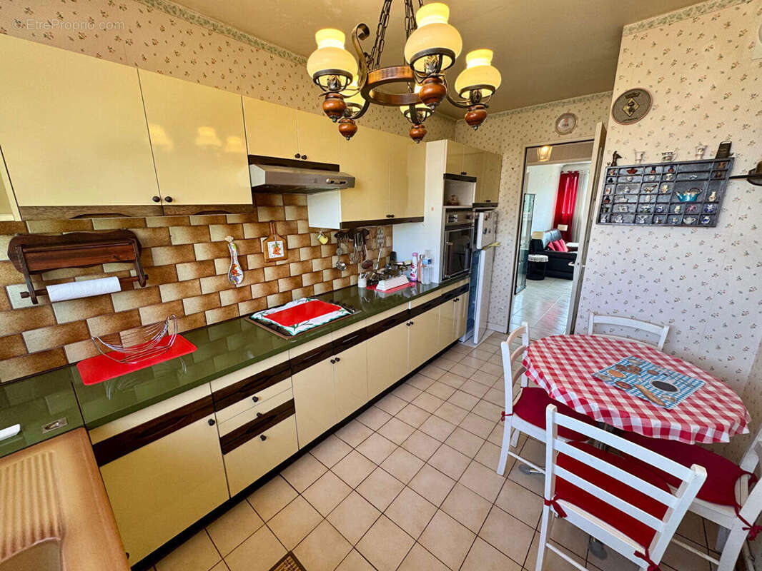 Grand 2 pèces 51m² : Parking + Cave - photo 6