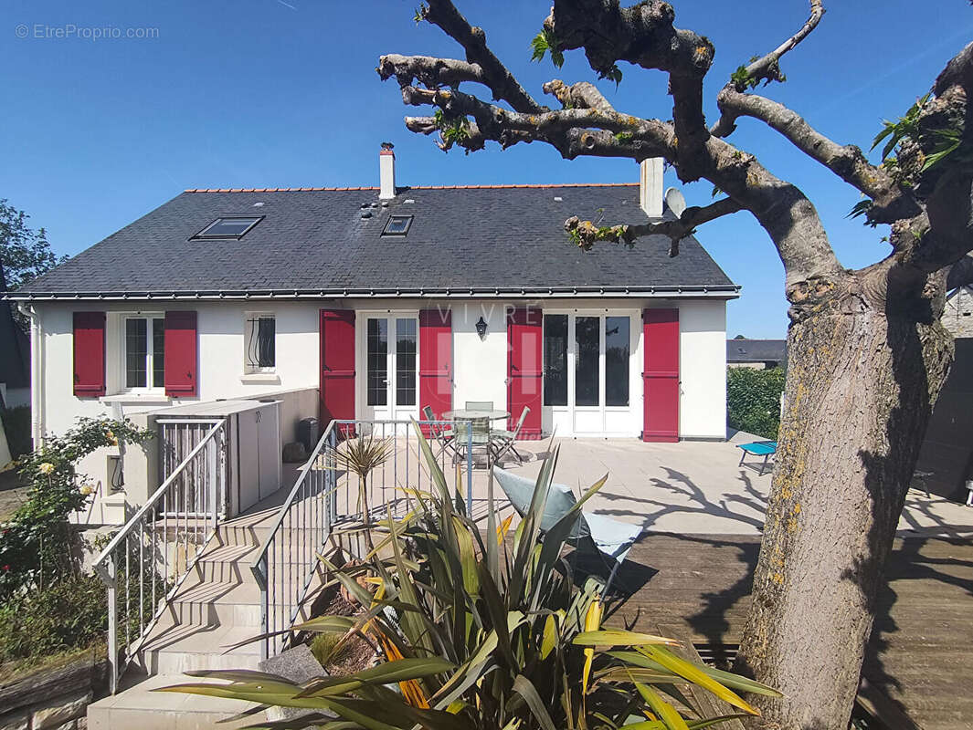 Maison familiale de 125 m² avec sous-sol complet - photo 11