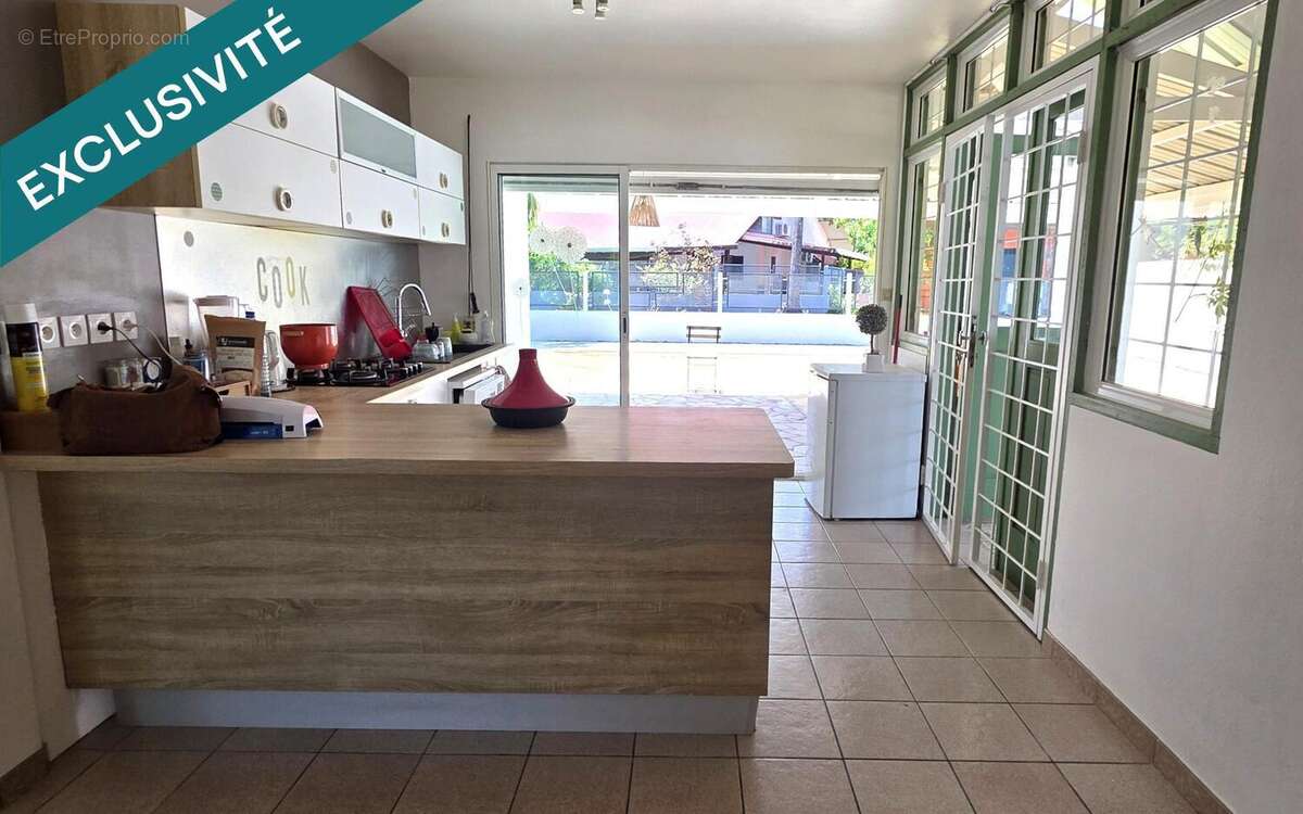 Photo 2 - Maison à REMIRE-MONTJOLY