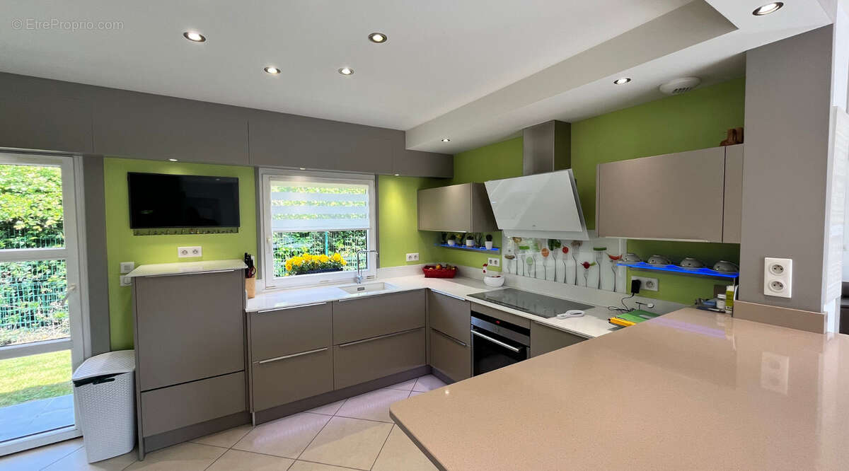 Plain-pied 4 chambres 120m² - photo 10
