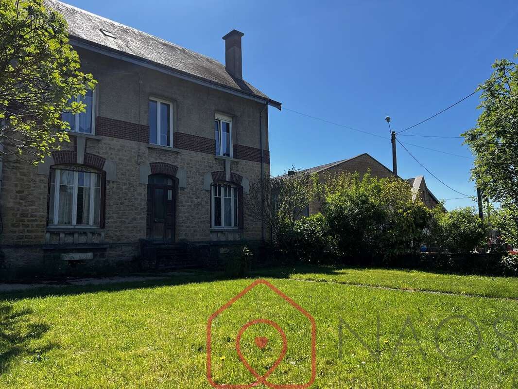 Maison à DONCHERY