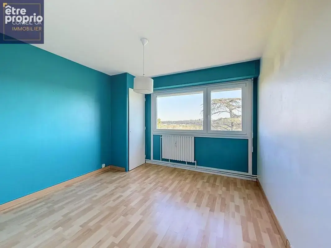 T3 - 75 m² - 2 chambres - balcon - cave et parking collectif - Irigny - photo 6