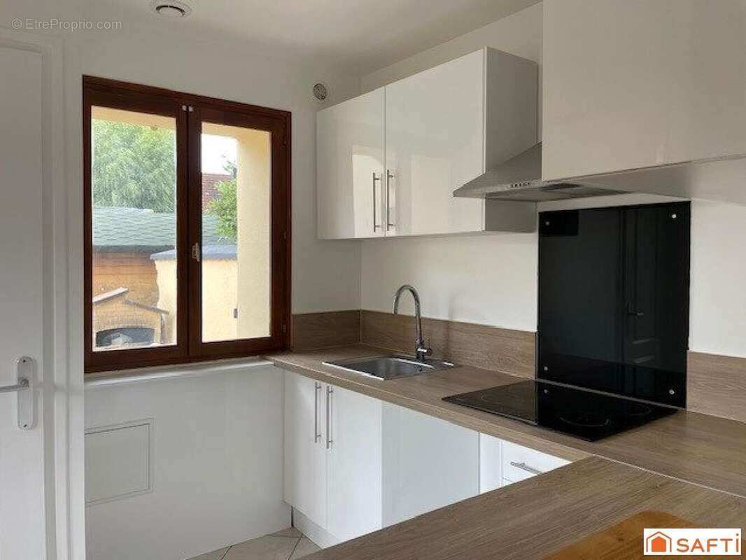 Photo 7 - Maison à LIEUSAINT