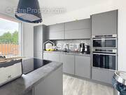 Photo 1 - Appartement à PREMESQUES