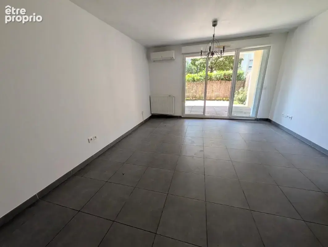 Appartement T3 RDJ avec parking centre ville au calme - photo 3