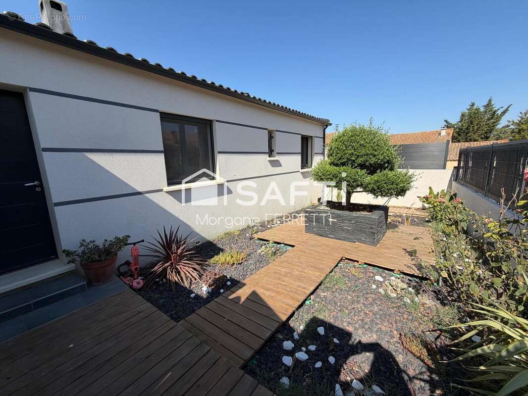 Photo 2 - Maison à MARCORIGNAN